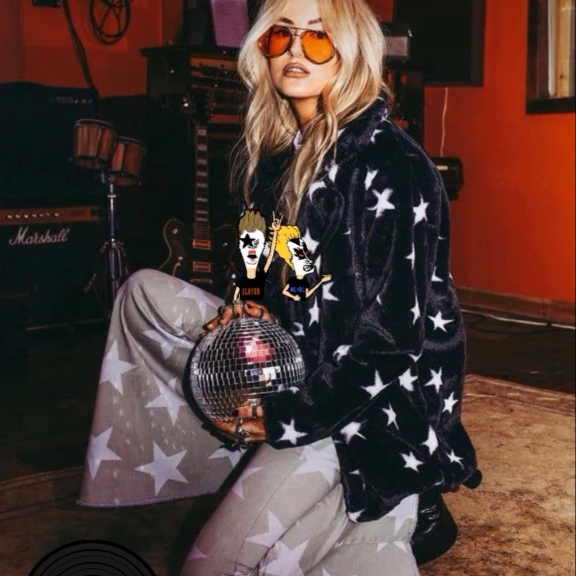 Natasha holding a mirror ball